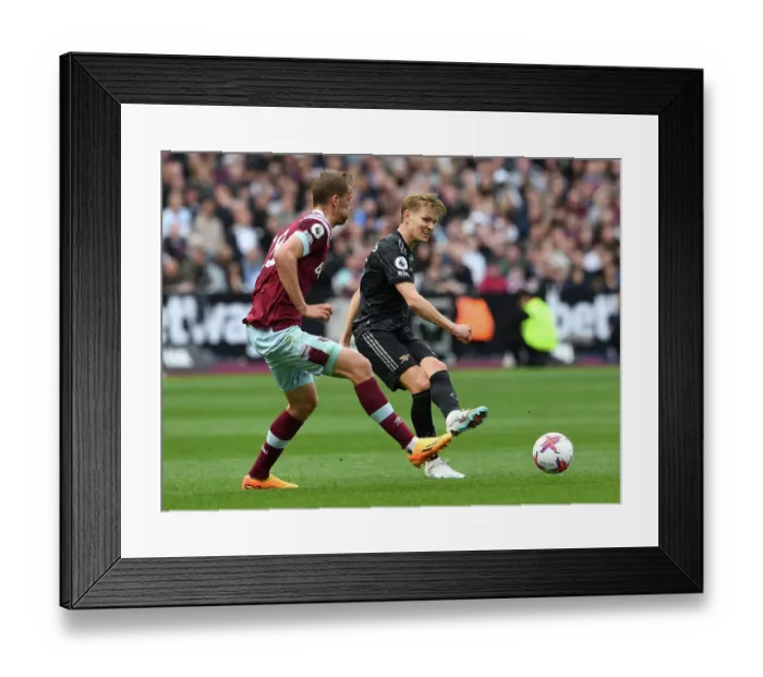 Framed Print : Clash of the Midfield Titans: Odegaard vs. Soucek at London Stadium Framed Print : Clash of the Midfield Titans: Odegaard vs. Soucek at London Stadium