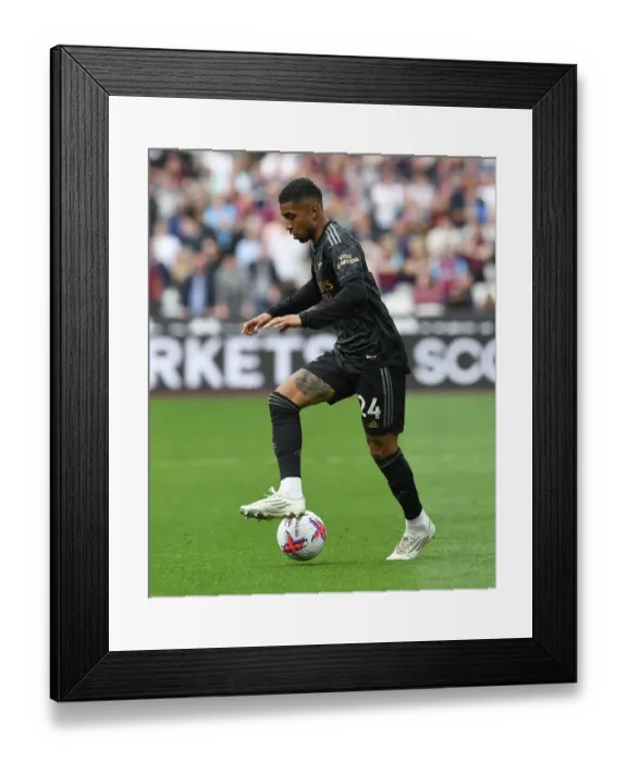 Framed Print : Reiss Nelson in Action: West Ham United vs. Arsenal FC - Premier League 2022-23