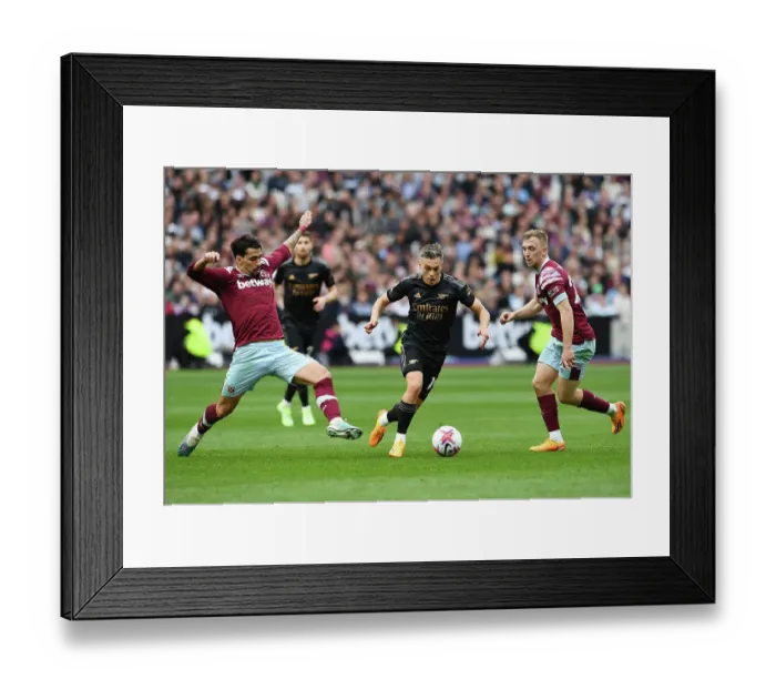 Framed Print : Clash at London Stadium: Trossard Faces Off Against Paqueta and Bowen
