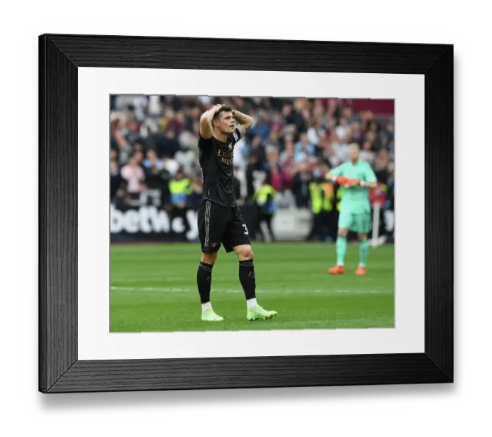 Framed Print : Granit Xhaka's Disappointment: Arsenal's Struggle Against West Ham United in the Premier League (April 2023)
