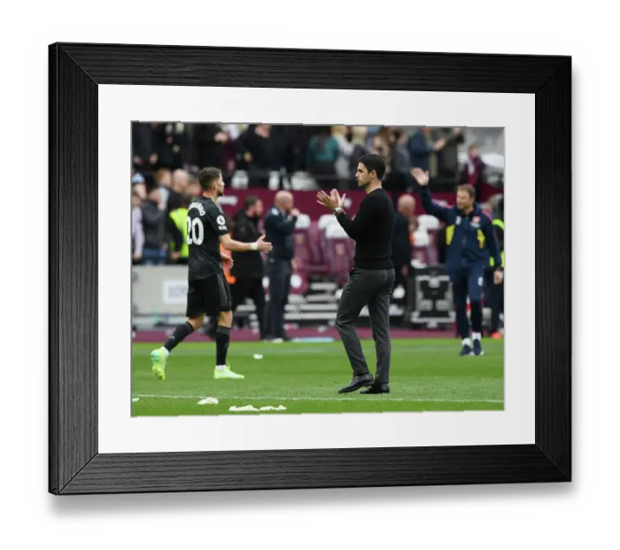 Framed Print : Mikel Arteta Celebrates Victory with Arsenal Fans: West Ham United vs. Arsenal, Premier League 2022-23