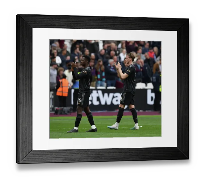 Framed Print : Arsenal Players Eddie Nketiah and Rob Holding Celebrate with Fans after West Ham Victory