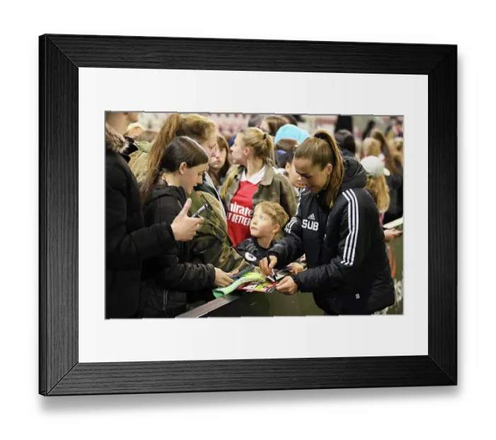 Framed Print : Arsenal Players Sign Autographs After FA Women's Super League Loss to Manchester United Framed Print : Arsenal Players Sign Autographs After FA Women's Super League Loss to Manchester United