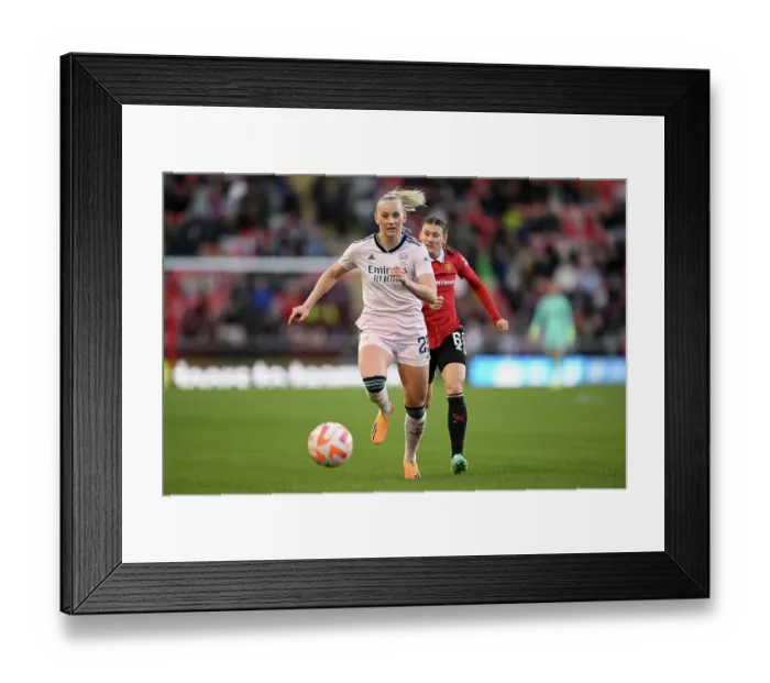 Framed Print : Arsenal's Stina Blackstenius Faces Off Against Manchester United's Hannah Blundell in FA Women's Super League Clash Framed Print : Arsenal's Stina Blackstenius Faces Off Against Manchester United's Hannah Blundell in FA Women's Super League Clash