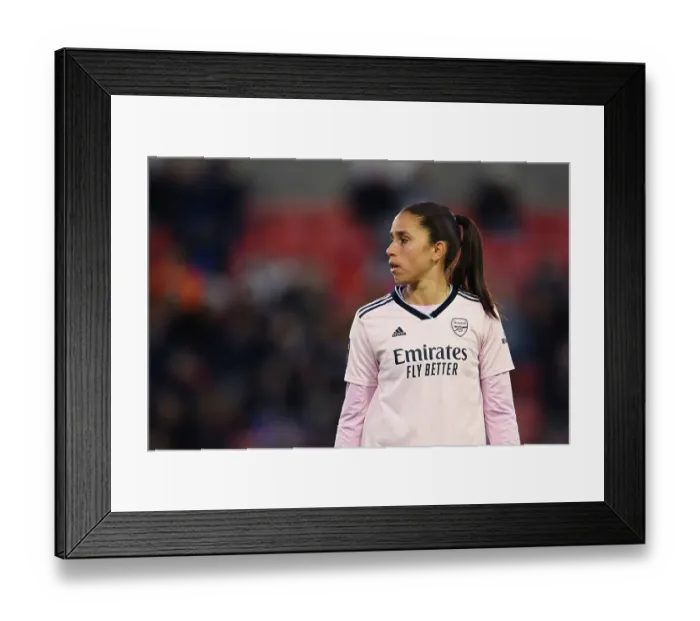 Framed Print : Arsenal's Rafaelle Souza Goes Head-to-Head with Manchester United in FA Women's Super League Showdown
