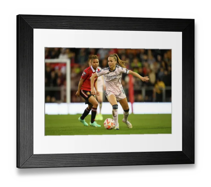 Framed Print : Arsenal vs Manchester United: FA Women's Super League Showdown at Leigh Sports Village - A Battle of Football Giants