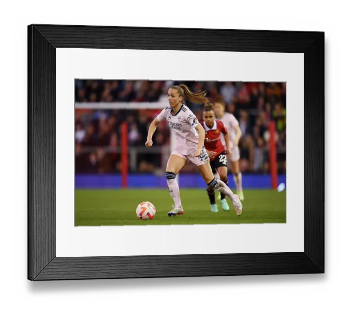 Framed Print : Arsenal's Lia Walti Goes Head-to-Head with Manchester United in FA Women's Super League Showdown