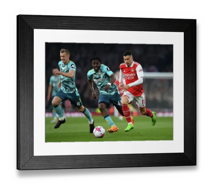 Framed Print : Arsenal vs. Southampton: Gabriel Martinelli Fights for Possession in Premier League Clash Framed Print : Arsenal vs. Southampton: Gabriel Martinelli Fights for Possession in Premier League Clash