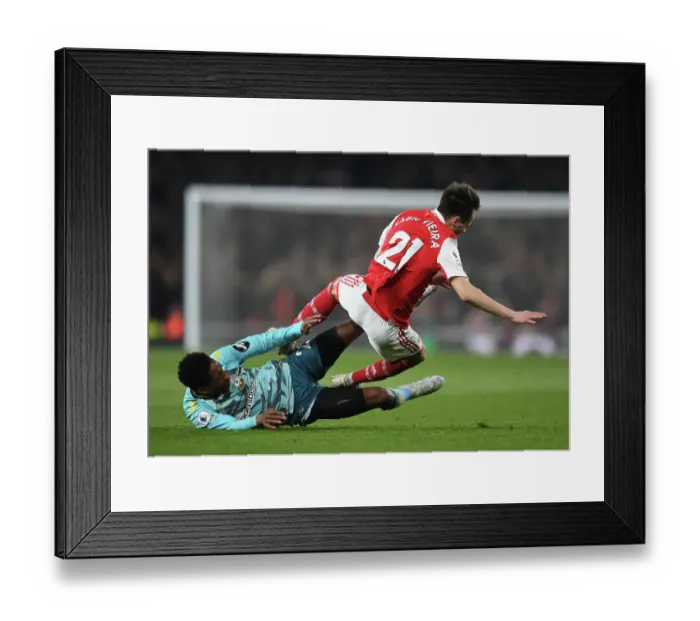 Framed Print : Arsenal vs Southampton: Fabio Vieira Clashes with Kyle Walker-Peters in Intense Premier League Showdown (2022-23)