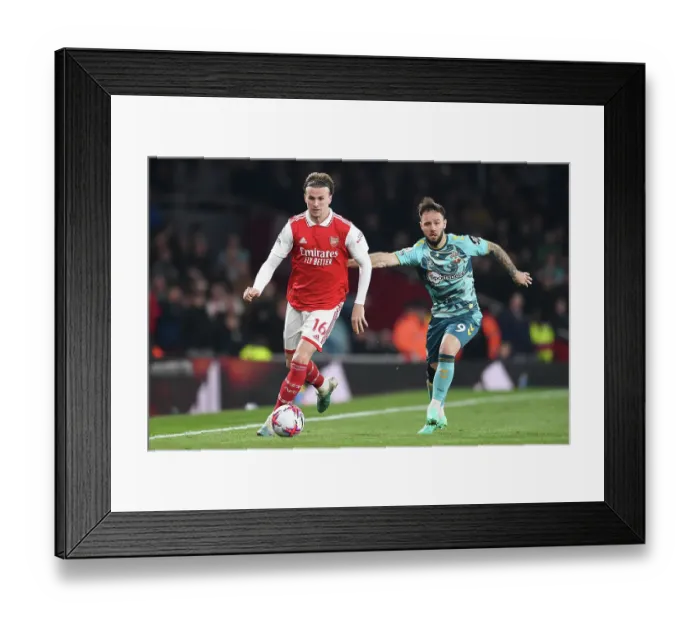 Framed Print : Arsenal vs Southampton: A Battle for Premier League Supremacy - Holding vs Armstrong Clash