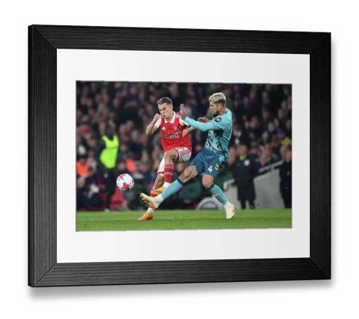 Framed Print : Arsenal vs. Southampton: Trossard Fights for Possession in Intense Premier League Clash