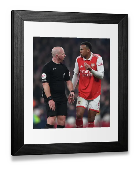 Framed Print : Arsenal's Gabriel Magalhaes Contests Referee's Call with Southampton, Premier League 2022-23