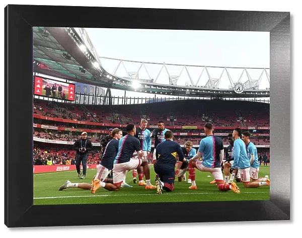 Arsenal FC vs Southampton FC: Premier League Showdown - Arsenal Players Warm Up at Emirates Stadium