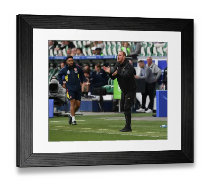 Framed Print : Arsenal Women's Coach Jonas Eidevall Leads Team in UEFA Champions League Semifinal Against VfL Wolfsburg