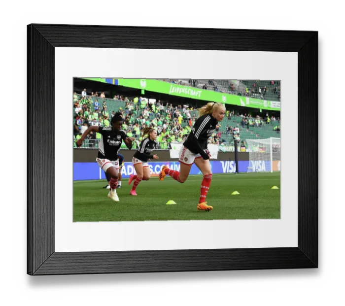 Framed Print : Arsenal Women's Team Prepares for UEFA Champions League Semi-Final Showdown against VfL Wolfsburg