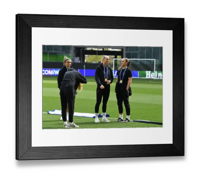 Framed Print : Arsenal Women's Squad Prepares for UEFA Champions League Semi-Final Clash Against VfL Wolfsburg