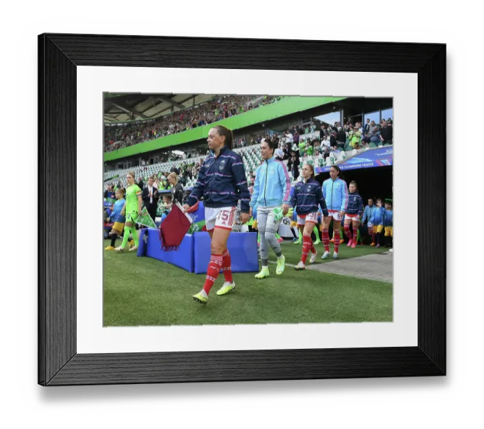 Framed Print : Arsenal Women's Team Advances to UEFA Champions League Semifinals: Katie McCabe Leads the Charge vs. VfL Wolfsburg