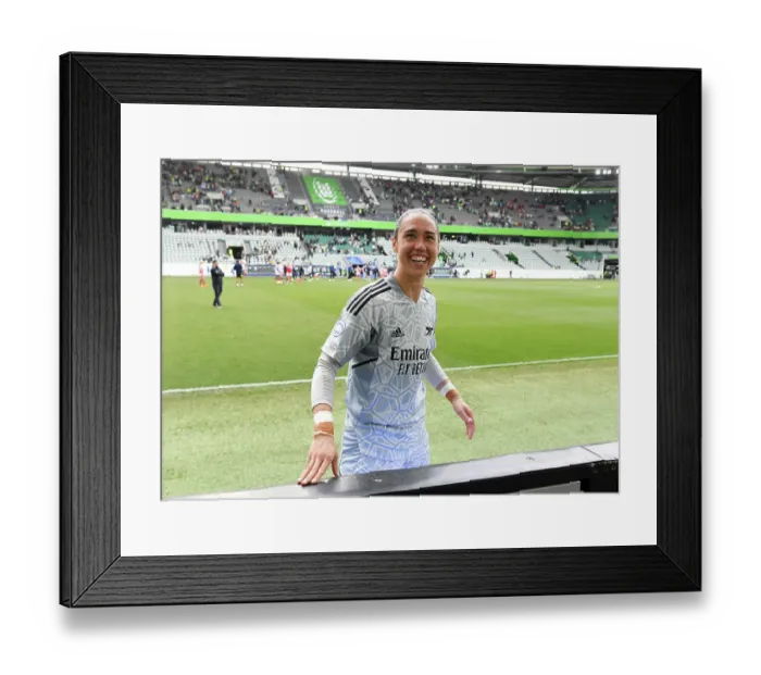 Framed Print : Arsenal Women Advance to UEFA Champions League Final: Manuela Zinsberger Celebrates Semi-Final Victory over VfL Wolfsburg