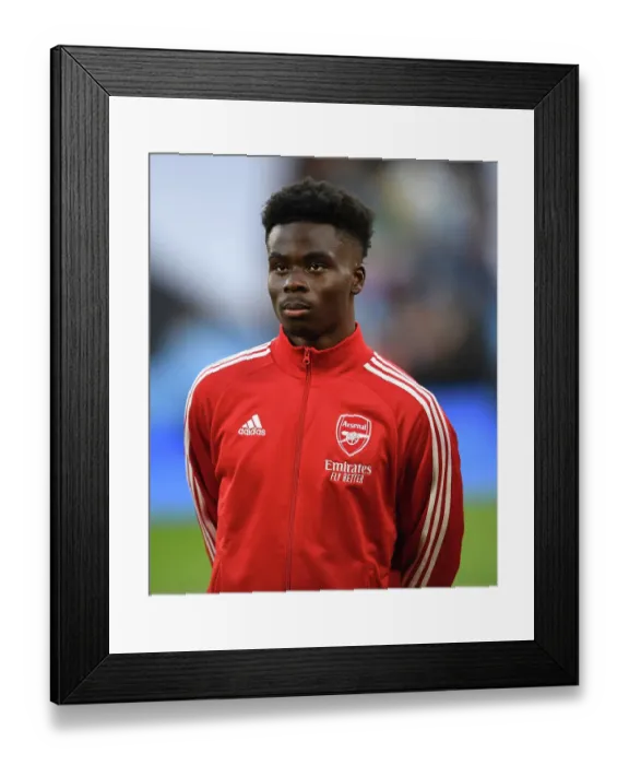 Framed Print : Arsenal's Bukayo Saka Gears Up for Manchester City Showdown - Premier League 2022-23