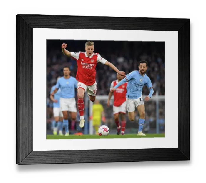 Framed Print : MANCHESTER, ENGLAND - APRIL 26: Oleksandr Zinchenko of Arsenal is challenged by Bernardo Silva of Manchester City during the Premier League match between Manchester City and Arsenal FC at Etihad Stadium on April 26, 2023 in Manchester, England Framed Print : MANCHESTER, ENGLAND - APRIL 26: Oleksandr Zinchenko of Arsenal is challenged by Bernardo Silva of Manchester City during the Premier League match between Manchester City and Arsenal FC at Etihad Stadium on April 26, 2023 in Manchester, England