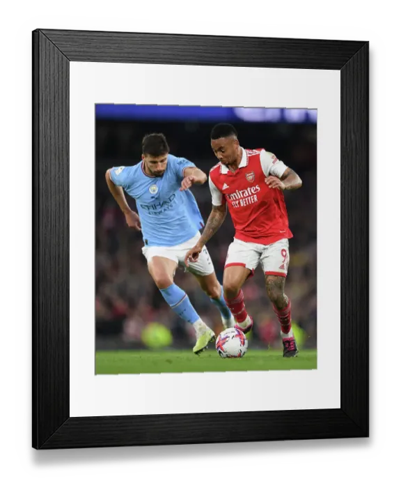 Framed Print : Gabriel Jesus vs Ruben Dias: Clash of Titans in Manchester City vs Arsenal FC Premier League Showdown