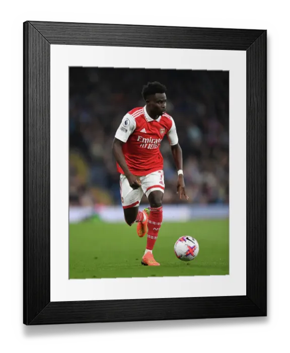 Framed Print : Bukayo Saka in Action: Manchester City vs. Arsenal, Premier League 2022-23 Framed Print : Bukayo Saka in Action: Manchester City vs. Arsenal, Premier League 2022-23