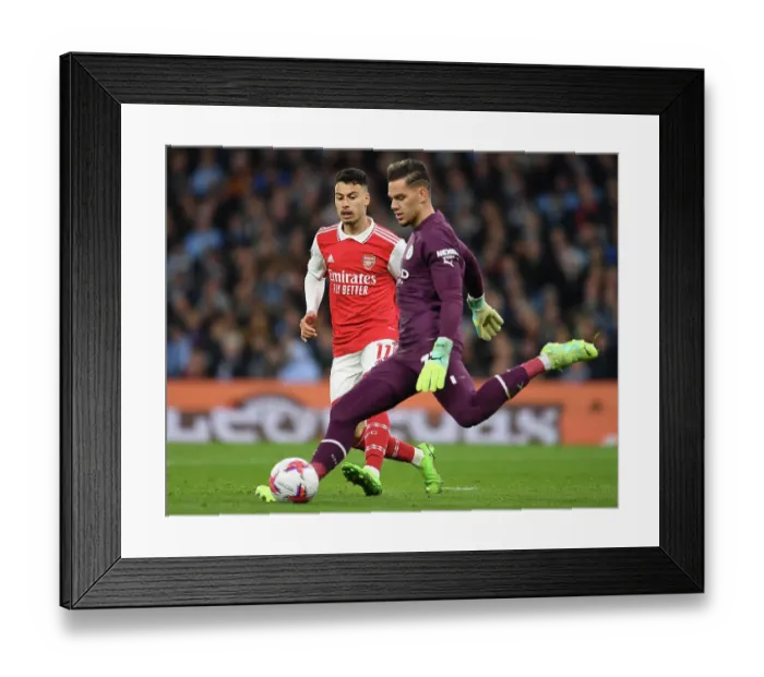 Framed Print : Clash at the Etihad: Martinelli Chases Down Ederson in Manchester City vs. Arsenal Premier League Showdown