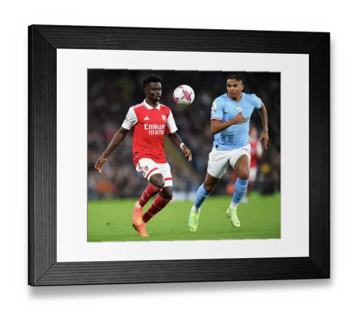 Framed Print : Saka vs. Akanji: A Premier League Battle for Supremacy - Manchester City vs. Arsenal, 2022-23