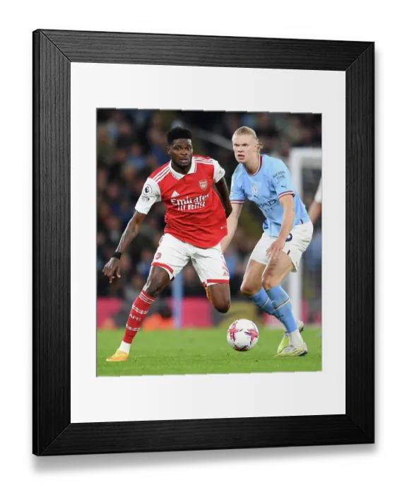 Framed Print : Thomas Partey vs Erling Haaland: Clash of the Titans - Manchester City vs Arsenal, Premier League 2022-23
