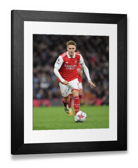 Framed Print : Arsenal's Martin Odegaard Faces Manchester City in Premier League Showdown (2022-23)