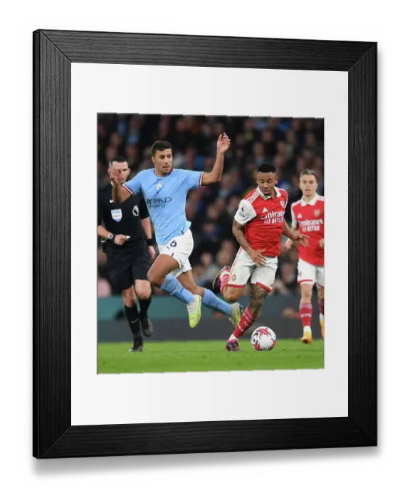 Framed Print : Clash of the Titans: Gabriel Jesus vs. Rodri - Manchester City vs. Arsenal FC, Premier League 2022-23: A Battle of Midfield Masters Framed Print : Clash of the Titans: Gabriel Jesus vs. Rodri - Manchester City vs. Arsenal FC, Premier League 2022-23: A Battle of Midfield Masters