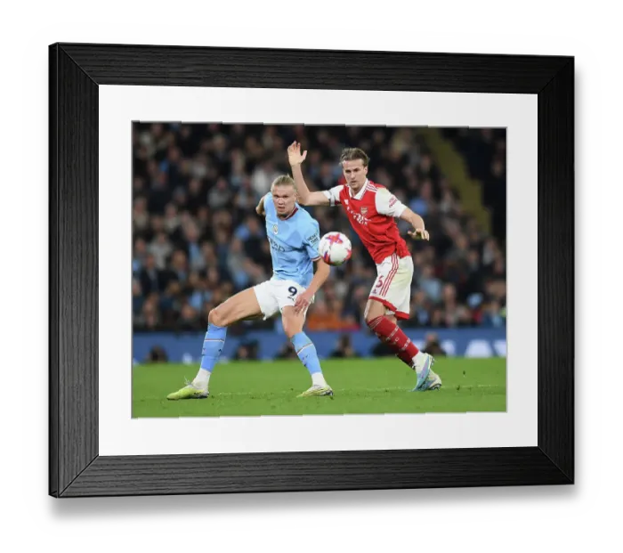 Framed Print : Rivalry Renewed: Holding Stands Firm Against Haaland in Manchester City vs. Arsenal Clash (Premier League 2022-23) Framed Print : Rivalry Renewed: Holding Stands Firm Against Haaland in Manchester City vs. Arsenal Clash (Premier League 2022-23)