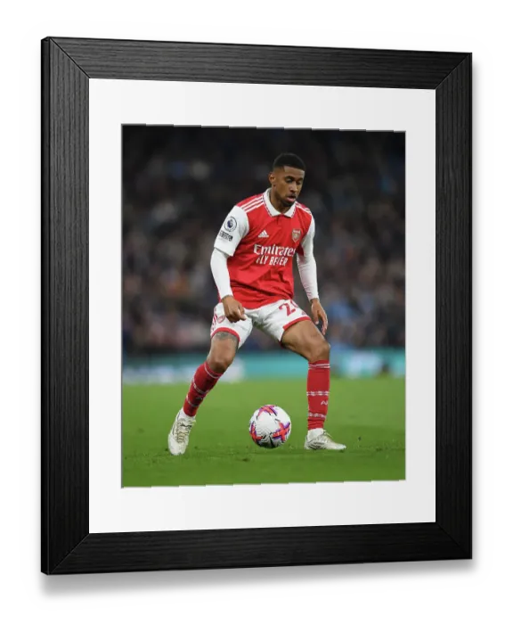Framed Print : Reiss Nelson Faces Manchester City: Arsenal's Premier League Battle (2022-23)