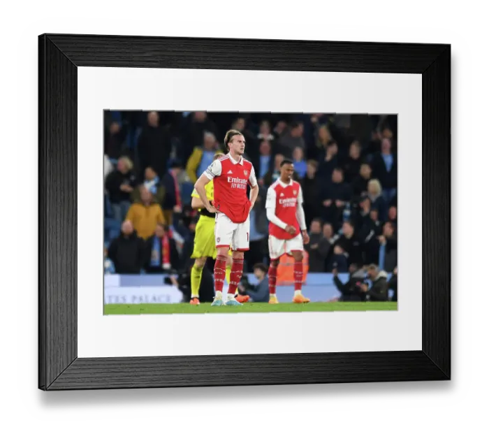 Framed Print : Manchester City's Haaland Holds Reign: Arsenal's Holding Disappointed After Fourth Goal Framed Print : Manchester City's Haaland Holds Reign: Arsenal's Holding Disappointed After Fourth Goal