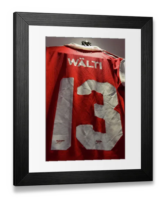 Framed Print : Arsenal Women's Intense Focus: Lia Waelti and the Dressing Room Before the UEFA Champions League Semifinal Showdown Against VfL Wolfsburg (2022-23)