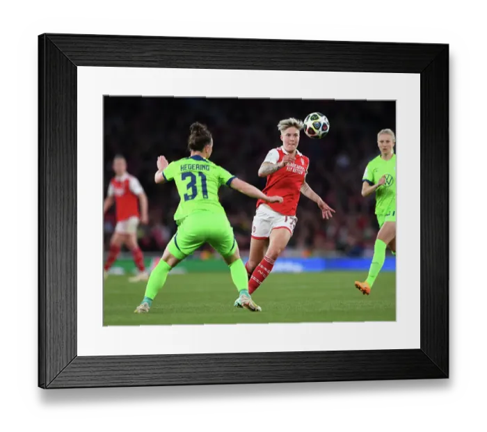 Framed Print : Arsenal vs. VfL Wolfsburg: Intense Battle for UEFA Women's Champions League Semifinal Victory