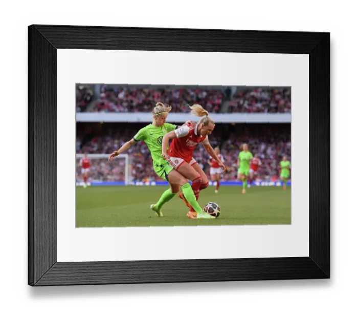 Framed Print : Arsenal vs. VfL Wolfsburg: A Battle for Possession in the UEFA Women's Champions League Semifinal