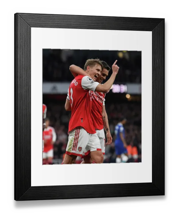 Framed Print : Arsenal's Martin Odegaard and Leandro Trossard Celebrate Goal Against Chelsea in 2022-23 Premier League