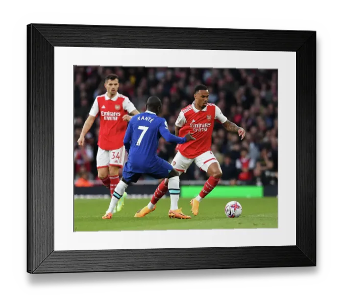 Framed Print : Arsenal's Gabriel Faces Off Against Chelsea's Kante in Intense Premier League Clash