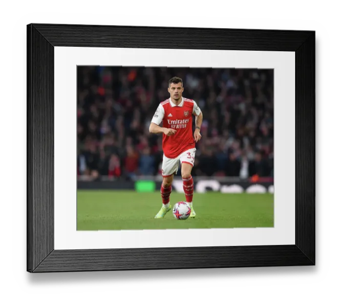 Framed Print : Arsenal's Xhaka Clashes with Chelsea in Intense 2022-23 Premier League Showdown