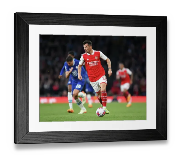 Framed Print : Granit Xhaka Charges Forward: Arsenal vs. Chelsea, Premier League 2022-23 Framed Print : Granit Xhaka Charges Forward: Arsenal vs. Chelsea, Premier League 2022-23