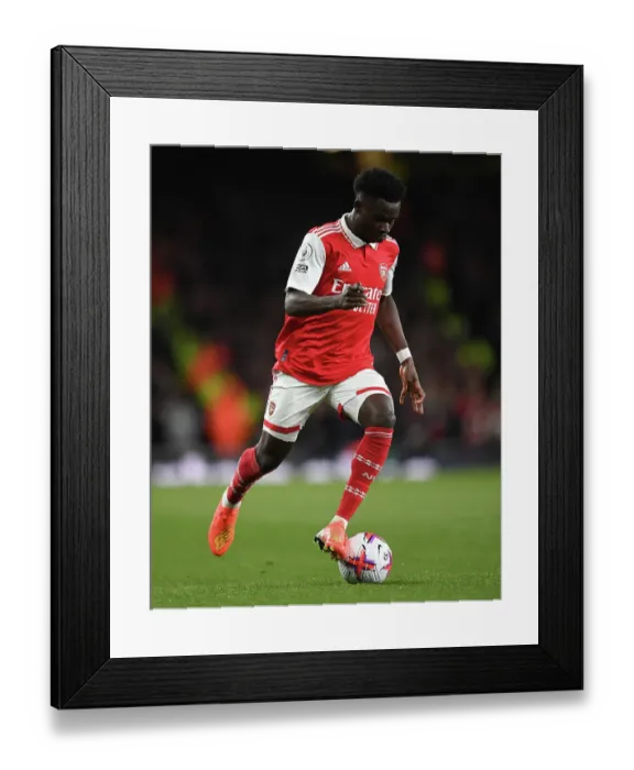 Framed Print : Arsenal's Bukayo Saka in Action Against Chelsea in the 2022-23 Premier League Clash Framed Print : Arsenal's Bukayo Saka in Action Against Chelsea in the 2022-23 Premier League Clash