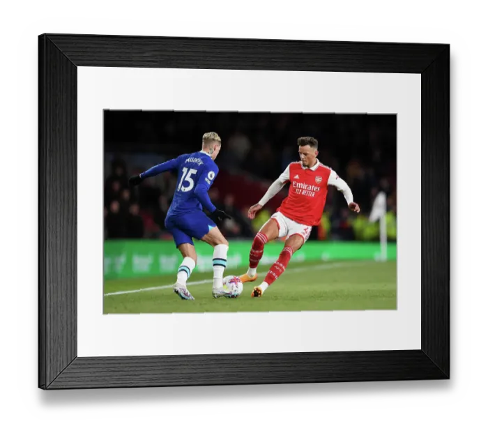 Framed Print : Arsenal vs. Chelsea: A Fight for Possession in the 2022-23 Premier League - White vs. Mudryk Framed Print : Arsenal vs. Chelsea: A Fight for Possession in the 2022-23 Premier League - White vs. Mudryk