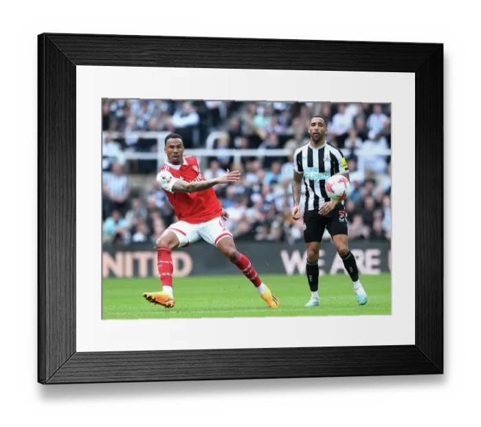 Framed Print : Gabriel Faces Pressure: Newcastle vs. Arsenal, Premier League 2022-23
