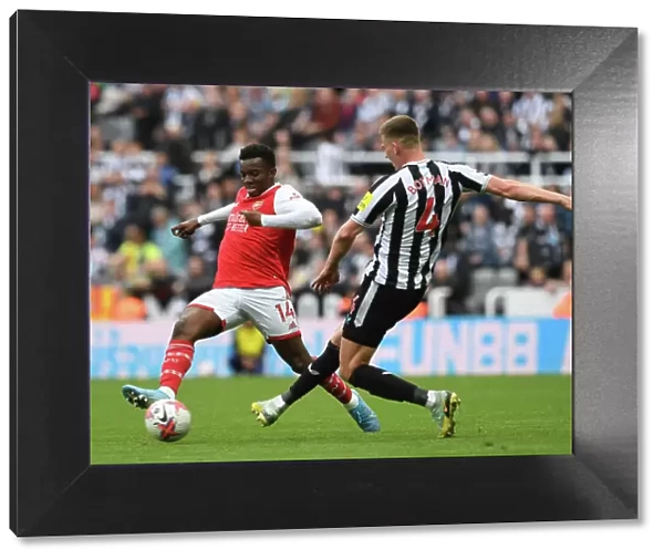 Clash at St. James Park: Arsenal's Nketiah Faces Off Against Newcastle's Botman in Premier League Showdown