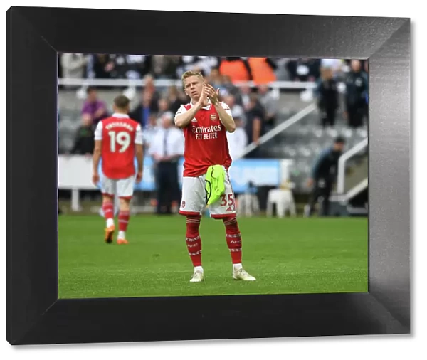 Arsenal's Oleksandr Zinchenko Celebrates with Fans after Newcastle Victory, Premier League 2022-23