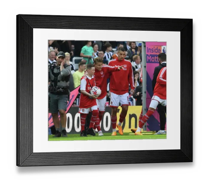 Framed Print : Martin Odegaard and Arsenal Mascot Before Newcastle United vs Arsenal FC, Premier League 2022-23