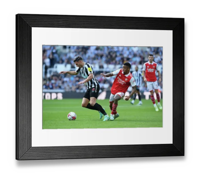 Framed Print : Fierce Rivalry: Gabriel Jesus vs. Fabian Schaer Clash in Newcastle United vs. Arsenal FC Premier League Showdown