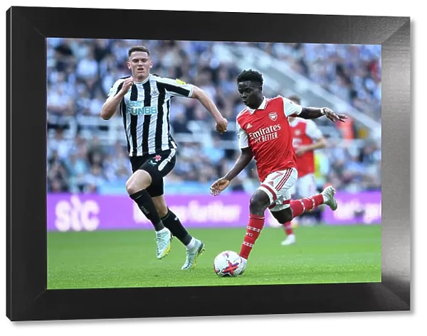 Bukayo Saka vs Newcastle: Intense Battle at St. James Park - Arsenal vs Newcastle United, Premier League 2022-23