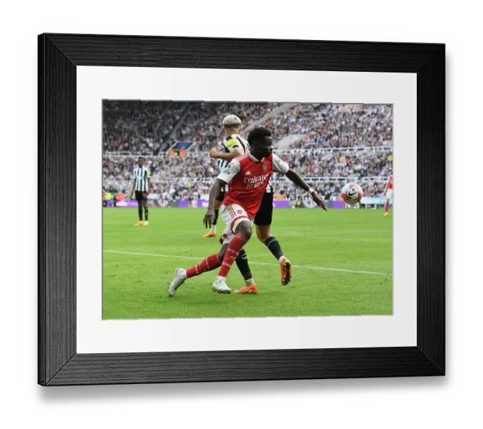 Framed Print : Bukayo Saka in Action: Arsenal vs. Newcastle United, Premier League 2022-23 Framed Print : Bukayo Saka in Action: Arsenal vs. Newcastle United, Premier League 2022-23